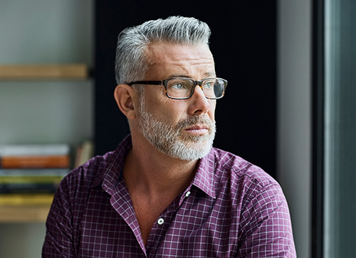 older man with glasses